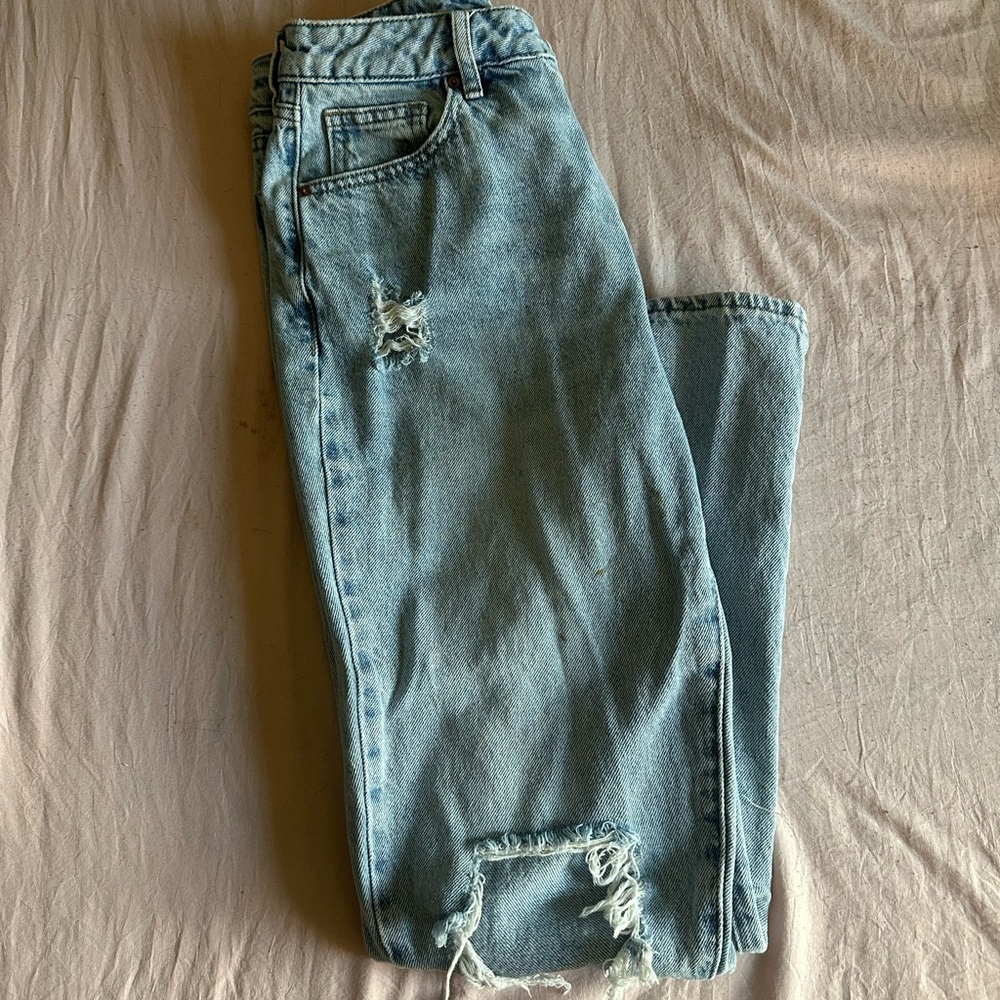 Distressed Light Blue Denim Jeans